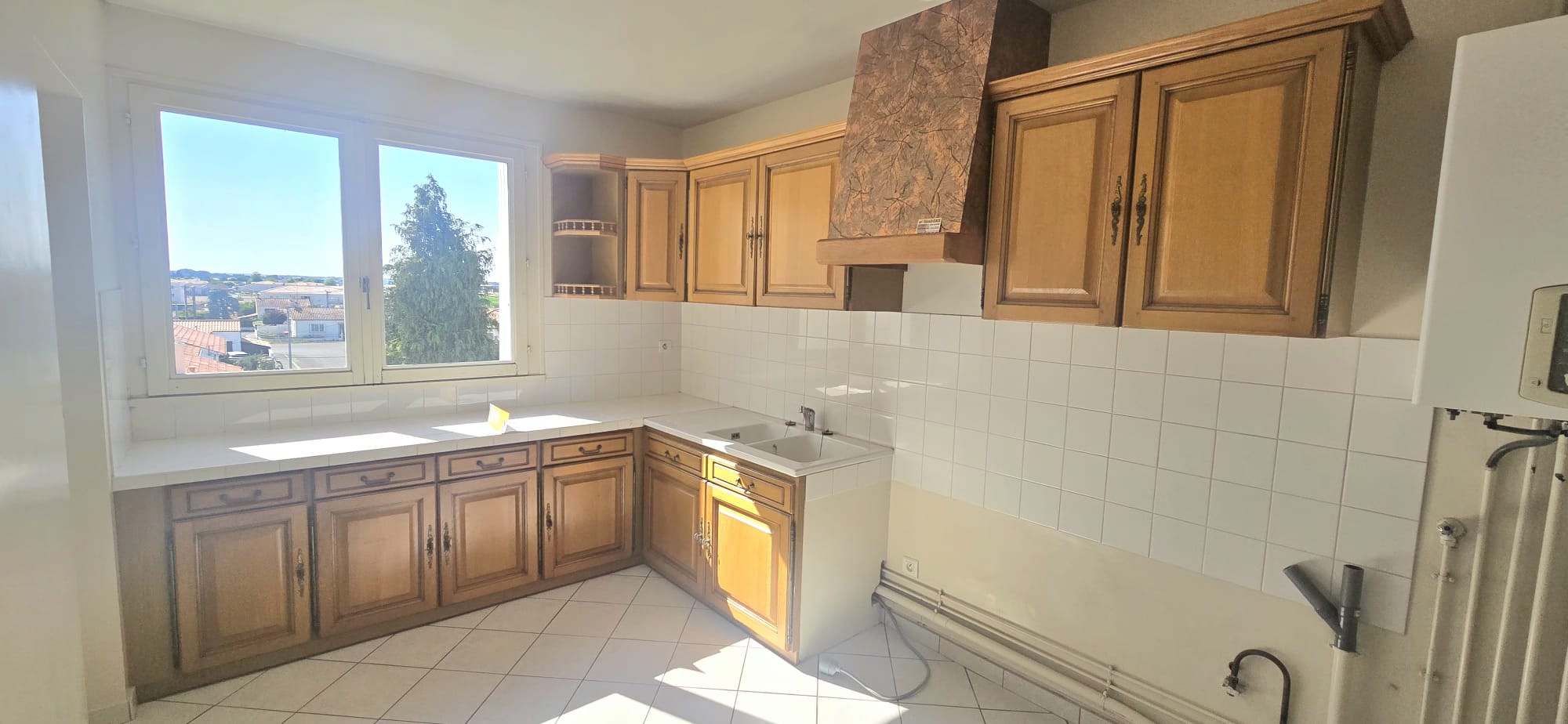 Appartement - 102 m2 - 3 ch + cave + garage + une place de p
